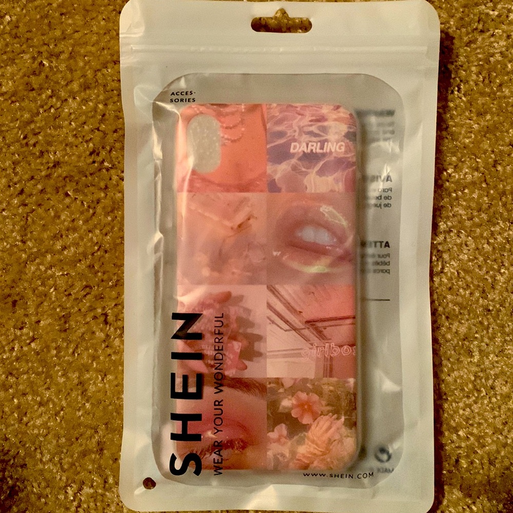 An unused phone case..thats pink with graphics on it.